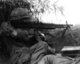 Vietnam: US Army sergeant firing a machine gun during an engagement in South Vietnam, c. 1966
