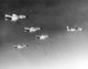 Vietnam: Led by an RB-66 Destroyer, pilots flying Air Force F-4C Phantoms drop bombs on a Communist military target in North Vietnam., August 1966